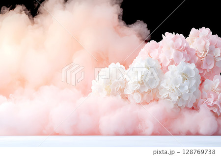 Soft Pink and White Flowers Emerging from a Dreamy Cloud of Pink Smoke on Black Background Soft Pink and White Flowers Emerging from a Dreamy Cloud of Pink Smoke on Black Background 128769738