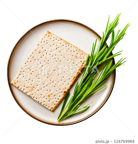 Crisp Bread Slice with Fresh Green Herbs on a Simple Plate Setting Crisp Bread Slice with Fresh Green Herbs on a Simple Plate Setting 128769968