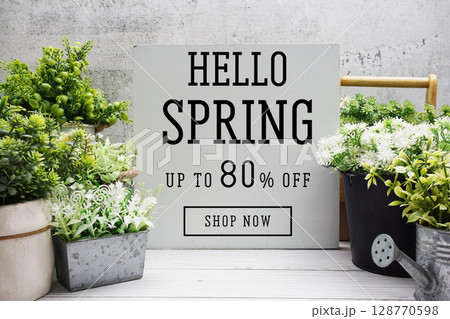 Hello Spring Sale 80% off Promotion Offer Discount Retail Shopping Concept 128770598