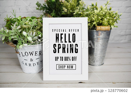Hello Spring Sale 80% off Promotion Offer Discount Retail Shopping Concept Hello Spring Sale 80% off Promotion Offer Discount Retail Shopping Concept 128770602