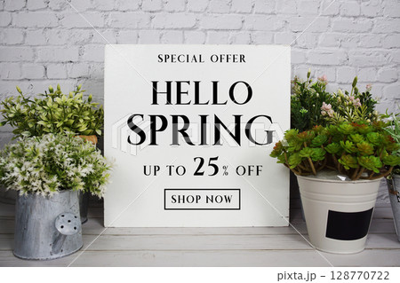 Hello Spring Sale 25% off Promotion Offer Discount Retail Shopping Concept 128770722