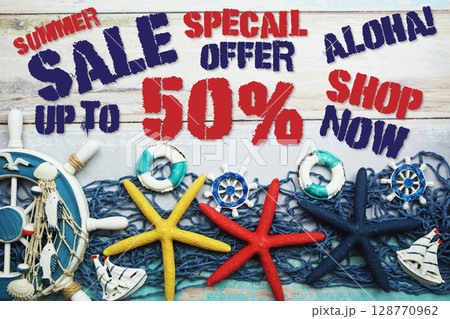 Summer Sale 50% off with Nautical and summer decoration on wooden background Summer Sale 50% off with Nautical and summer decoration on wooden background 128770962