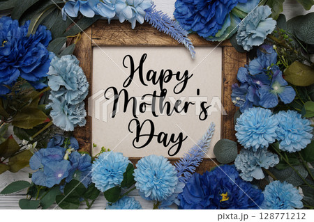 Happy Mother's Day text with flowers bouquet decoration on wooden background 128771212