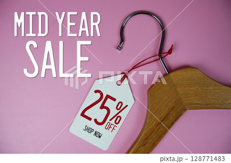 Mid Year Sale 25% off price tag label with Clothes hanger Clothing Promotion shopping concept Mid Year Sale 25% off price tag label with Clothes hanger Clothing Promotion shopping concept 128771483