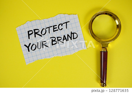 Rotect Your Brand text written on paper with magnifying glass 128771635