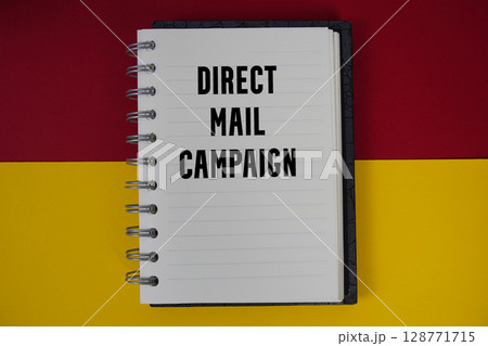 Direct Mail Campaign text written on notebook paper 128771715