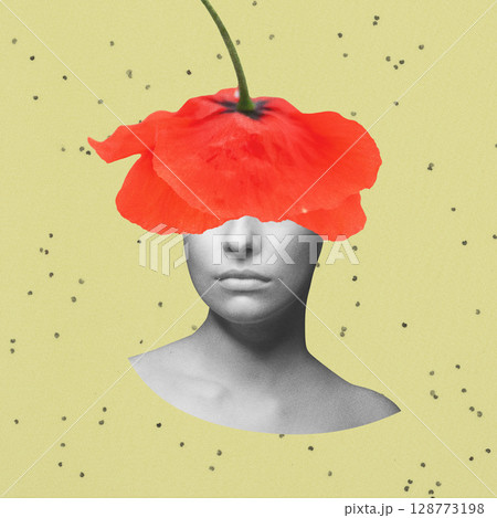 Woman covering her eyes and head with red poppy flower blossom 128773198