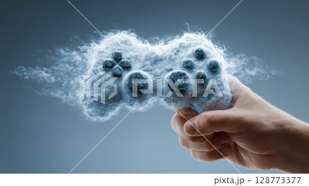 Hand holds cloud shaped gaming controller, symbolizing cloud gaming technology and innovation 128773377
