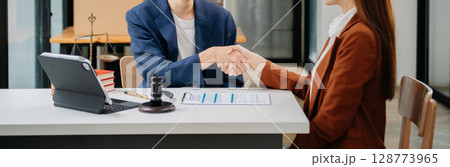 Business law concept, Lawyer business lawyers are consulting lawyers for women entrepreneurs to file copyright lawsuit with laptop and tablet at office Business law concept, Lawyer business lawyers are consulting lawyers for women entrepreneurs to file copyright lawsuit with laptop and tablet at office 128773965