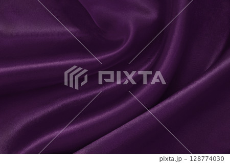 Purple fabric cloth texture for background and design art work, beautiful crumpled pattern of silk or linen. 128774030
