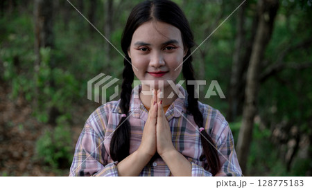 Grateful woman having HOPE praying to God. Spiritual girl smiling to sky. Happy female being thankful. Spiritual girl praying with hope. Positive asian young woman feeling hope and faith looking up. Grateful woman having HOPE praying to God. Spiritual girl smiling to sky. Happy female being thankful. Spiritual girl praying with hope. Positive asian young woman feeling hope and faith looking up. 128775183