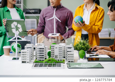 Business team people planning hand using laptop for working technology and business Net zero and carbon neutral concept 128775784