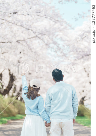 Couple tourist sightseeing Kitakami Tenshochi Park with Sakura Cherry Blossom in Spring, traveler travel in Kitakami festival, Iwate prefecture, Japan. Landmark for Travel and Vacation destination Couple tourist sightseeing Kitakami Tenshochi Park with Sakura Cherry Blossom in Spring, traveler travel in Kitakami festival, Iwate prefecture, Japan. Landmark for Travel and Vacation destination 128777462