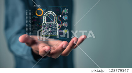 Protect data privacy with cybersecurity as a digital padlock is presented on a hand Protect data privacy with cybersecurity as a digital padlock is presented on a hand 128779547