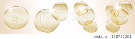 Gold argan oil drops with bubbles 3d render set. Honey, liquid serum, collagen gel or retinol vitamin balls. Clear yellow blobs of hyaluronic essence or keratin for skin or hair care. 3D illustration 128782201