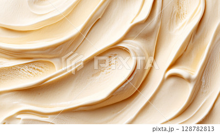 Ice cream texture close up showing intricate patterns, ideal as dessert background Ice cream texture close up showing intricate patterns, ideal as dessert background 128782813