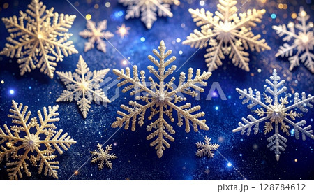 A festive blue Christmas and New Year background with a pattern of decorative snowflakes and stars A festive blue Christmas and New Year background with a pattern of decorative snowflakes and stars 128784612