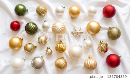 Golden Easter eggs and golden egg in a red box with pearl and gold Christmas decoration Golden Easter eggs and golden egg in a red box with pearl and gold Christmas decoration 128784889