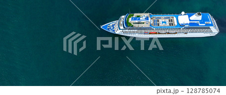 Aerial view cruise ship liner on ocean sea, Luxury cruise ship liner modern maritime travel lifestyle ocean sea, Cruise ship liner exclusive tourism travel on holiday take vacation time. 128785074