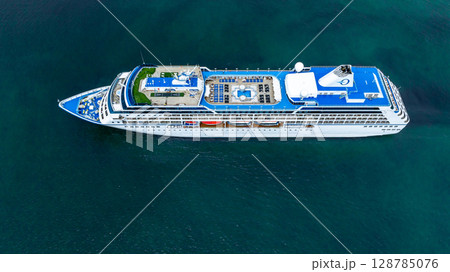 Aerial view cruise ship liner on ocean sea, Luxury cruise ship liner modern maritime travel lifestyle ocean sea, Cruise ship liner exclusive tourism travel on holiday take vacation time. 128785076