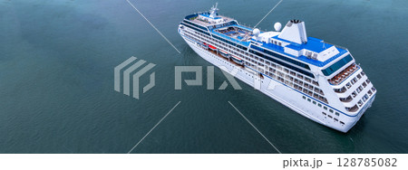 Aerial view cruise ship liner on ocean sea, Luxury cruise ship liner modern maritime travel lifestyle ocean sea, Cruise ship liner exclusive tourism travel on holiday take vacation time. 128785082
