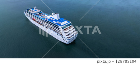 Aerial view cruise ship liner on ocean sea, Luxury cruise ship liner modern maritime travel lifestyle ocean sea, Cruise ship liner exclusive tourism travel on holiday take vacation time. Aerial view cruise ship liner on ocean sea, Luxury cruise ship liner modern maritime travel lifestyle ocean sea, Cruise ship liner exclusive tourism travel on holiday take vacation time. 128785104