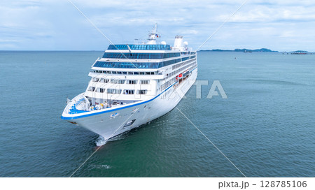 Aerial view cruise ship liner on ocean sea, Luxury cruise ship liner modern maritime travel lifestyle ocean sea, Cruise ship liner exclusive tourism travel on holiday take vacation time. 128785106