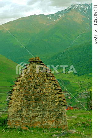 North Ossetia-Alania, Russia. City of the dead, ancient necropolis in the mountains of North Caucasus. 128786448