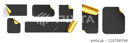 Black paper labels with gold corner curls Black paper labels with gold corner curls 128786596