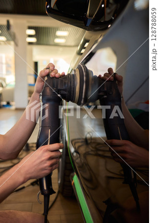 A Detailed Close Up of the Car Polishing Process in the Field of Automotive Detailing A Detailed Close Up of the Car Polishing Process in the Field of Automotive Detailing 128788059