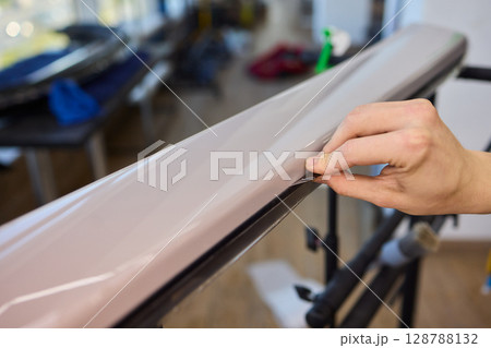 Applying a Protective Film on the Surface of Your Car for Enhanced Durability and Shine Applying a Protective Film on the Surface of Your Car for Enhanced Durability and Shine 128788132