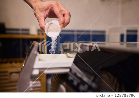 To achieve cleaner clothes, adding the right type of detergent to your washing machine is essential To achieve cleaner clothes, adding the right type of detergent to your washing machine is essential 128788796