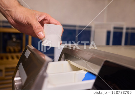 To achieve cleaner clothes, adding the right type of detergent to your washing machine is essential 128788799