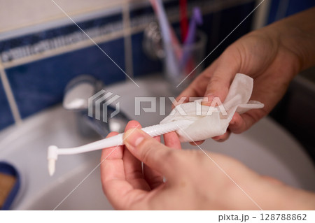 Ensuring your Toothbrush is thoroughly cleaned for optimal oral hygiene practices is essential 128788862