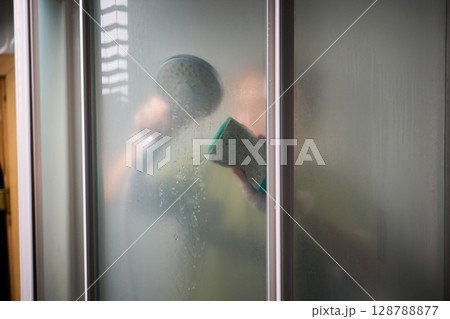 Cleaning the Shower A Glimpse Behind the Steam and the Importance of Hygiene and Care 128788877