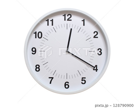 Simple white analog wall clock showing exactly 00:20 or 12:20. suitable for concepts like deadline, start or end of time. Isolated on a clean white background. 128790900