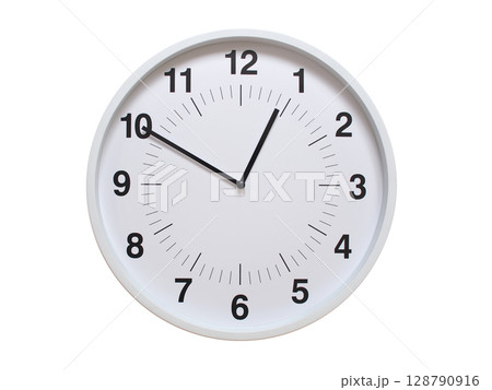 Simple white analog wall clock showing exactly 00:50 or 12:50. suitable for concepts like deadline, start or end of time. Isolated on a clean white background. Simple white analog wall clock showing exactly 00:50 or 12:50. suitable for concepts like deadline, start or end of time. Isolated on a clean white background. 128790916