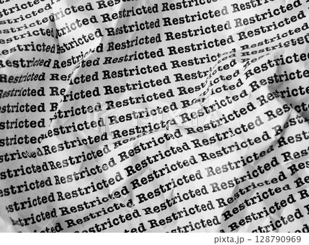 Words Restricted Seamless print on crumpled paper for business background. 128790969