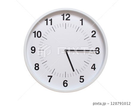 Simple white analog wall clock showing exactly 05:15 or 17:15. suitable for concepts like deadline, start or end of time. Isolated on a clean white background. Simple white analog wall clock showing exactly 05:15 or 17:15. suitable for concepts like deadline, start or end of time. Isolated on a clean white background. 128791012