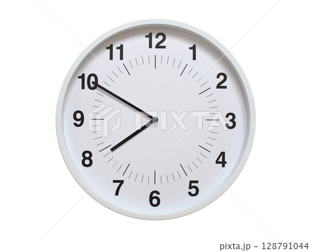 Simple white analog wall clock showing exactly 07:50 or 19:50. suitable for concepts like deadline, start or end of time. Isolated on a clean white background. Simple white analog wall clock showing exactly 07:50 or 19:50. suitable for concepts like deadline, start or end of time. Isolated on a clean white background. 128791044