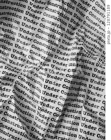 Words Under Construction Seamless print on crumpled paper for business background. Words Under Construction Seamless print on crumpled paper for business background. 128791189