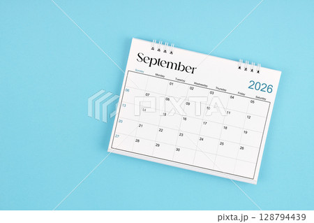 September 2026 Monthly desk calendar for 2026 year on blue color background. 128794439