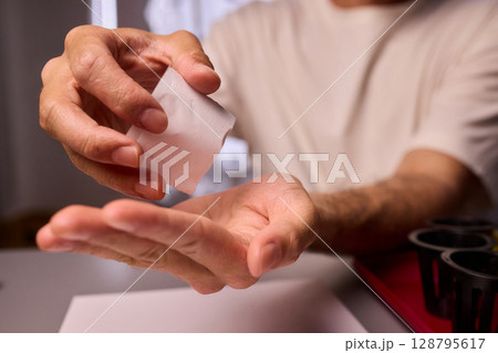 Hands Skillfully Managing Hydroponic Growing Medium with Exact Precise Careful Techniques Hands Skillfully Managing Hydroponic Growing Medium with Exact Precise Careful Techniques 128795617