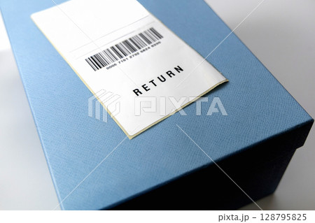 Return shipping label on the blue box Return shipping label on the blue box 128795825