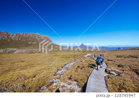 Hikers at Cradle Mountain in Tasmania Australia 128795947