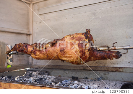 Spit Roasted Whole Animal Cooking A Unique Culinary Experience for Everyone Involved 128798555