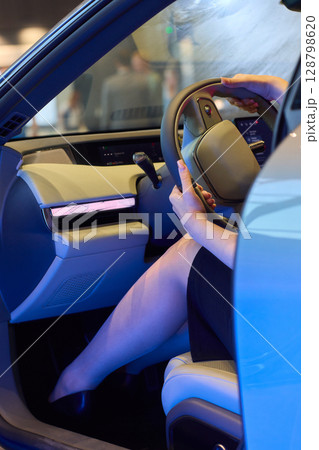 Exploring the Modern Car Interior Experience Through a Drivers Perspective in Detail Exploring the Modern Car Interior Experience Through a Drivers Perspective in Detail 128798620