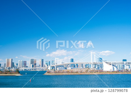 cityscape of Tokyo skyline with Tokyo tower and rainbow bridge at daytime in Japan cityscape of Tokyo skyline with Tokyo tower and rainbow bridge at daytime in Japan 128799078