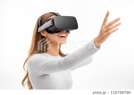 A woman wearing VR glasses, laughing and gesturing as if chatting with a virtual character, on plain background 128799790