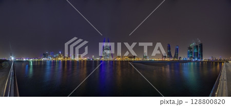 Skyline of Manama Bahrain with reflections at night Skyline of Manama Bahrain with reflections at night 128800820